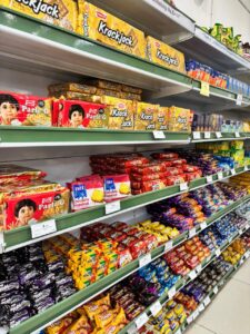 GUJCO Mart shelves with packaged goods